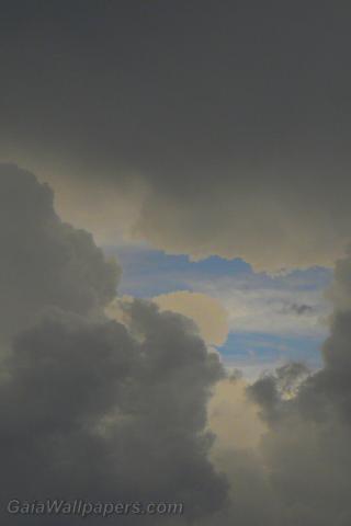 Blue sky through storm clouds - Free desktop wallpapers