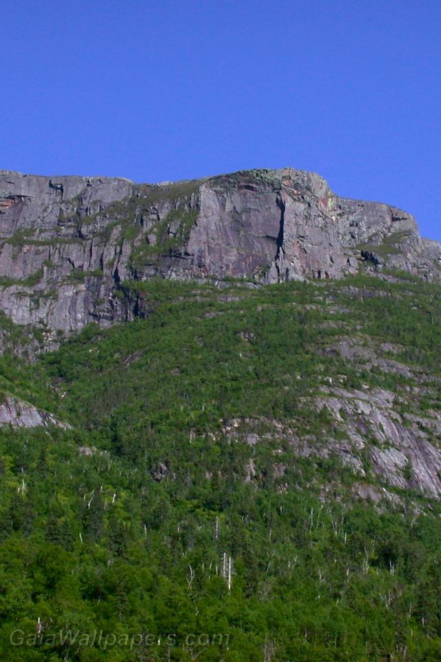 Cliff seen from the the river - Free desktop wallpapers