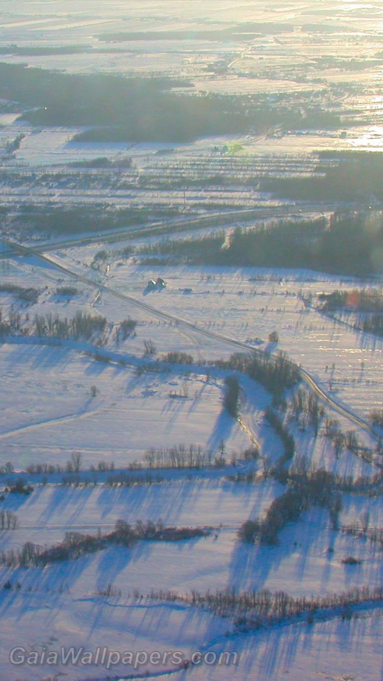 Farmland covered with snow seen from the air - Free desktop wallpapers