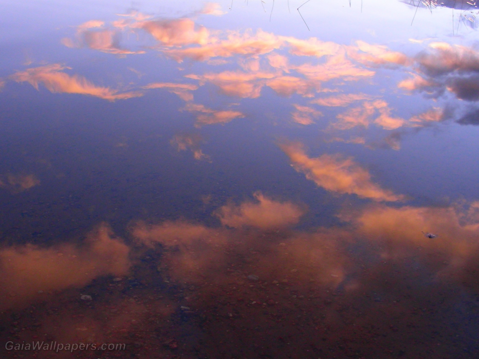 Sky reflecting on calm water - Free desktop wallpapers